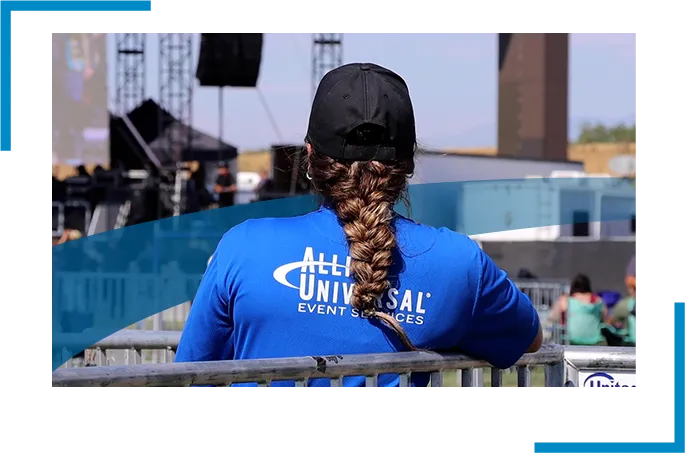A women at an event wearing blue allied universal uniform