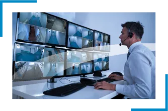 Security professional looking at the monitors